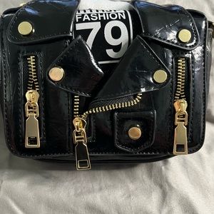 Motorcycle jacket crossbody bag